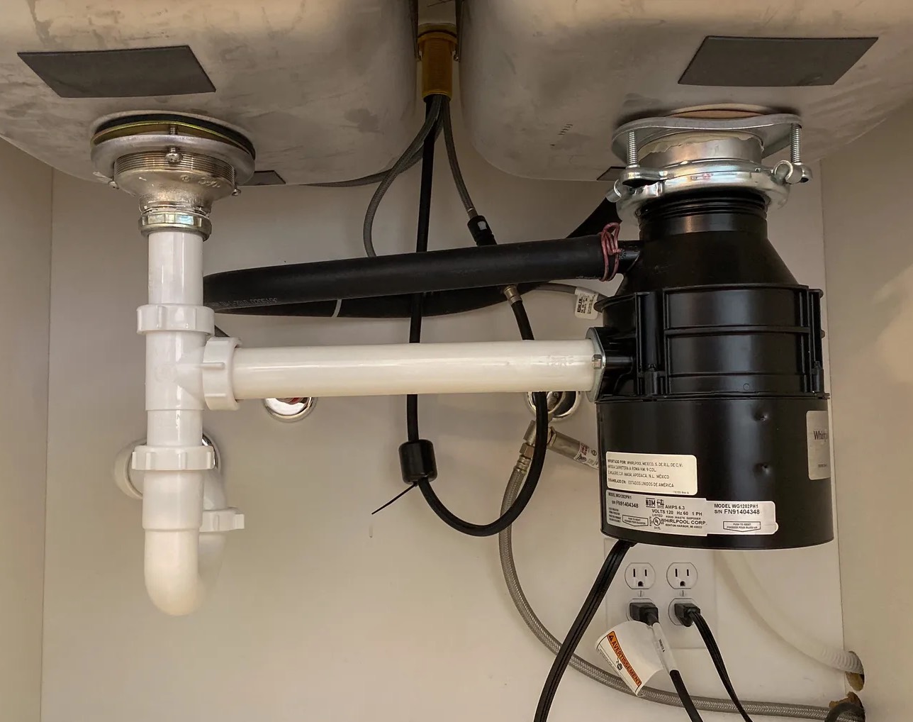 Leaky Garbage Disposal Cleanup in Plainville, CT
